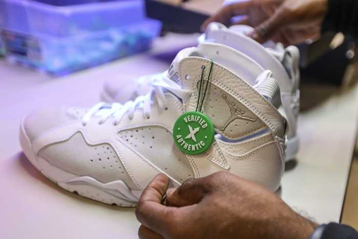View of white shoe at StockX facility.